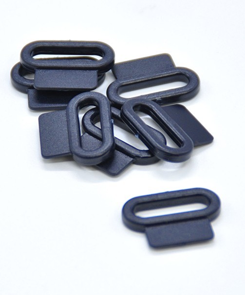 PASSANTS PLASTIQUES AVEC PATTE 20mm PASSANTS PLASTIQUES AVEC PATTE 20mm